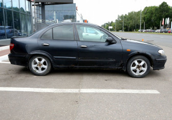 Подержанный автомобиль Nissan Almera Sedan 2002 года (7 фото)