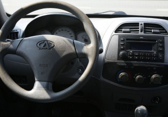 Подержанный автомобиль Chery Tiggo (T11) 2010 года (14 фото)