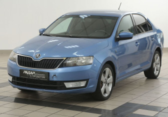 Подержанный автомобиль Skoda Rapid Liftback 2014 года (8 фото)