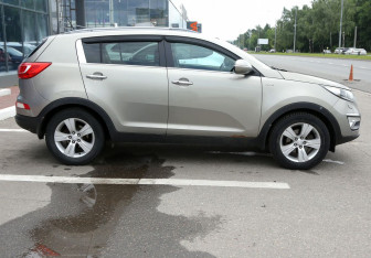 Подержанный автомобиль Kia Sportage 2010 года (7 фото)