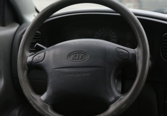 Подержанный автомобиль Kia Spectra Sedan 2008 года (16 фото)