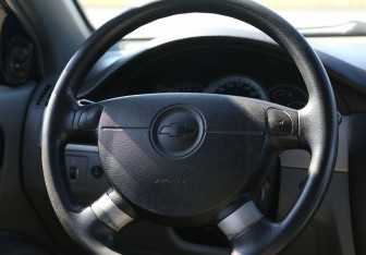 Подержанный автомобиль Chevrolet Lacetti Wagon 2005 года (16 фото)