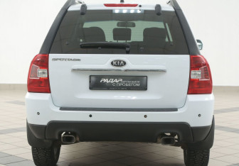 Подержанный автомобиль Kia Sportage 2010 года (3 фото)