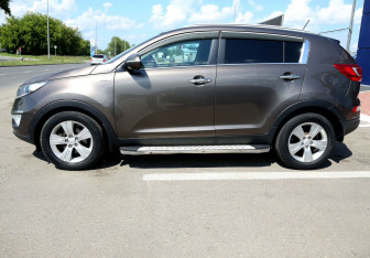 Подержанный автомобиль Kia Sportage 2012 года (8 фото)