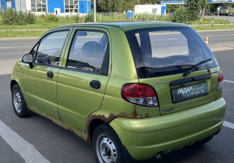 Подержанный автомобиль Daewoo Matiz 2012 года (6 фото)