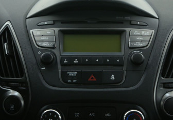 Подержанный автомобиль Hyundai ix35 2015 года (13 фото)