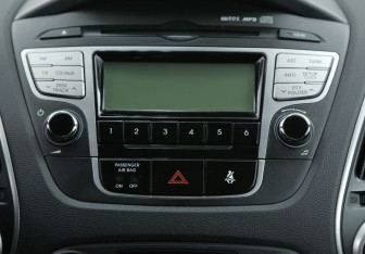 Подержанный автомобиль Hyundai ix35 2012 года (13 фото)