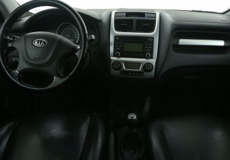 Подержанный автомобиль Kia Sportage 2010 года (12 фото)