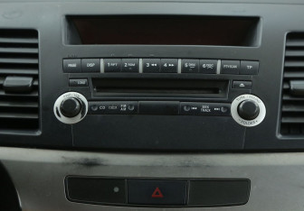 Подержанный автомобиль Mitsubishi Lancer Sedan 2008 года (13 фото)