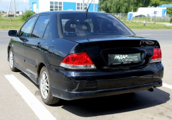 Подержанный автомобиль Mitsubishi Lancer Sedan 2006 года (4 фото)