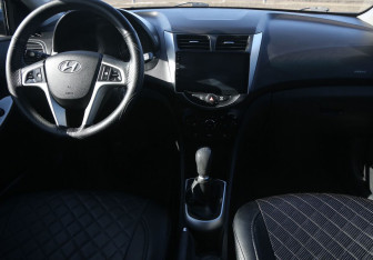 Подержанный автомобиль Hyundai Solaris Sedan 2013 года (12 фото)