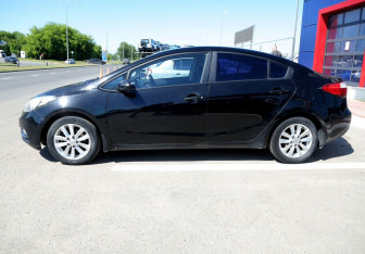 Подержанный автомобиль Kia Cerato Sedan 2013 года (8 фото)