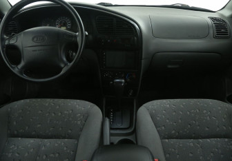 Подержанный автомобиль Kia Spectra Sedan 2008 года (12 фото)