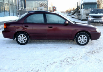 Подержанный автомобиль Kia Spectra Sedan 2008 года (7 фото)