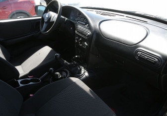 Подержанный автомобиль Chevrolet Niva 2013 года (9 фото)