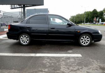 Подержанный автомобиль Kia Spectra Sedan 2007 года (7 фото)