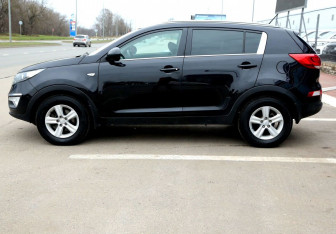 Подержанный автомобиль Kia Sportage 2014 года (8 фото)
