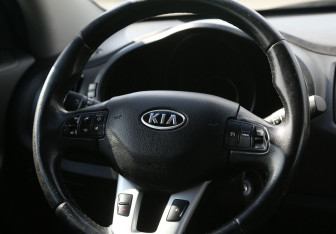 Подержанный автомобиль Kia Sportage 2012 года (18 фото)