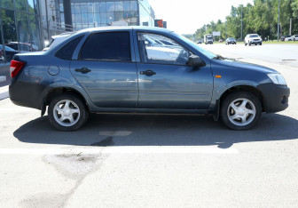 Подержанный автомобиль LADA (ВАЗ) Granta Sedan 2014 года (7 фото)