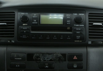 Подержанный автомобиль Toyota Corolla Sedan 2006 года (13 фото)