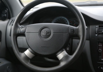 Подержанный автомобиль Daewoo Gentra Sedan 2014 года (14 фото)