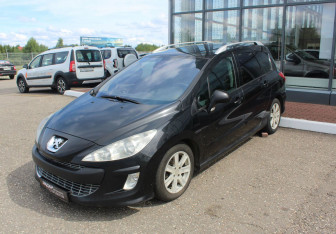Подержанный автомобиль Peugeot 308 Wagon 2010 года (3 фото)
