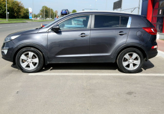 Подержанный автомобиль Kia Sportage 2012 года (8 фото)