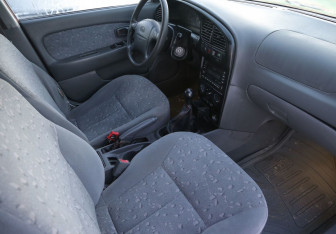 Подержанный автомобиль Kia Spectra Sedan 2008 года (9 фото)