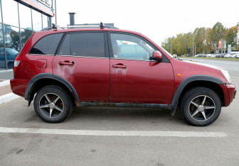 Подержанный автомобиль Chery Tiggo (T11) 2013 года (7 фото)