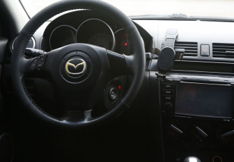 Подержанный автомобиль Mazda 3 Sedan 2008 года (14 фото)