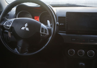 Подержанный автомобиль Mitsubishi Lancer Sedan 2008 года (14 фото)
