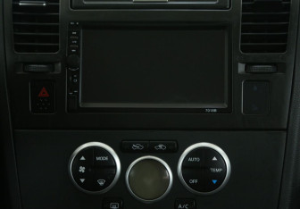 Подержанный автомобиль Nissan Tiida Hatchback 2007 года (13 фото)