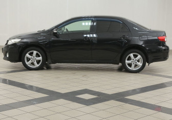 Подержанный автомобиль Toyota Corolla Sedan 2012 года (7 фото)