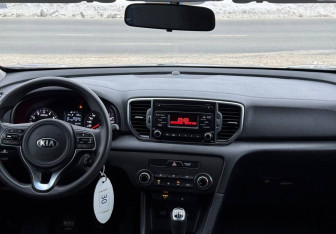 Подержанный автомобиль Kia Sportage 2018 года (10 фото)