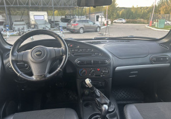 Подержанный автомобиль Chevrolet Niva 2012 года (13 фото)
