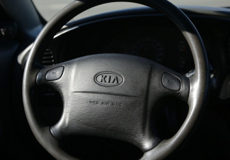 Подержанный автомобиль Kia Spectra Sedan 2007 года (16 фото)