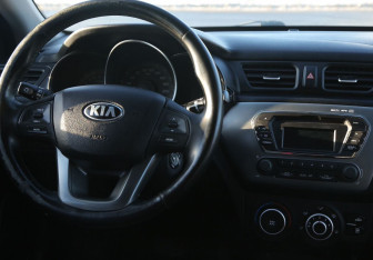 Подержанный автомобиль Kia Rio Sedan 2014 года (14 фото)