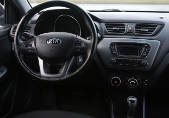 Подержанный автомобиль Kia Rio Sedan 2014 года (14 фото)