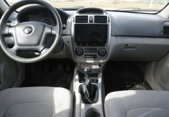 Подержанный автомобиль Kia Cerato Sedan 2006 года (12 фото)