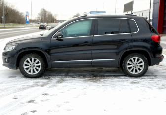 Подержанный автомобиль Volkswagen Tiguan 2011 года (8 фото)