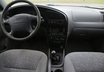 Подержанный автомобиль Kia Spectra Sedan 2008 года (12 фото)