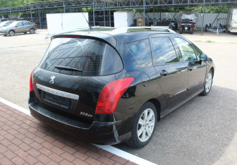 Подержанный автомобиль Peugeot 308 Wagon 2010 года (7 фото)
