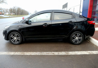 Подержанный автомобиль Kia Rio Sedan 2014 года (8 фото)