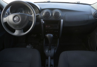 Подержанный автомобиль Nissan Almera Sedan 2013 года (12 фото)