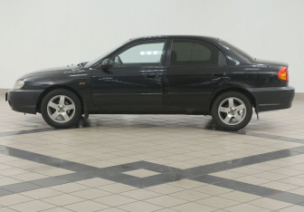 Подержанный автомобиль Kia Spectra Sedan 2006 года (7 фото)