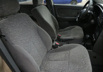 Подержанный автомобиль Kia Spectra Sedan 2009 года (10 фото)