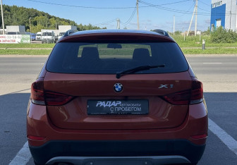 Подержанный автомобиль BMW X1 2013 года (5 фото)
