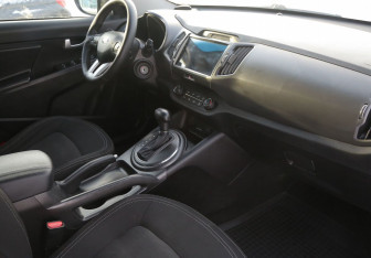 Подержанный автомобиль Kia Sportage 2013 года (9 фото)