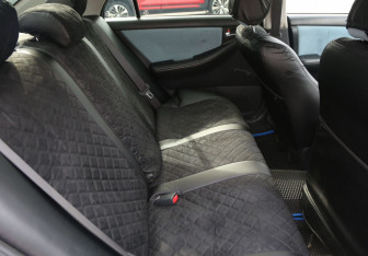 Подержанный автомобиль Toyota Corolla Sedan 2004 года (11 фото)