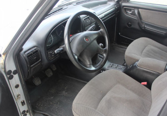 Подержанный автомобиль ГАЗ 31105 «Волга» 2006 года (10 фото)